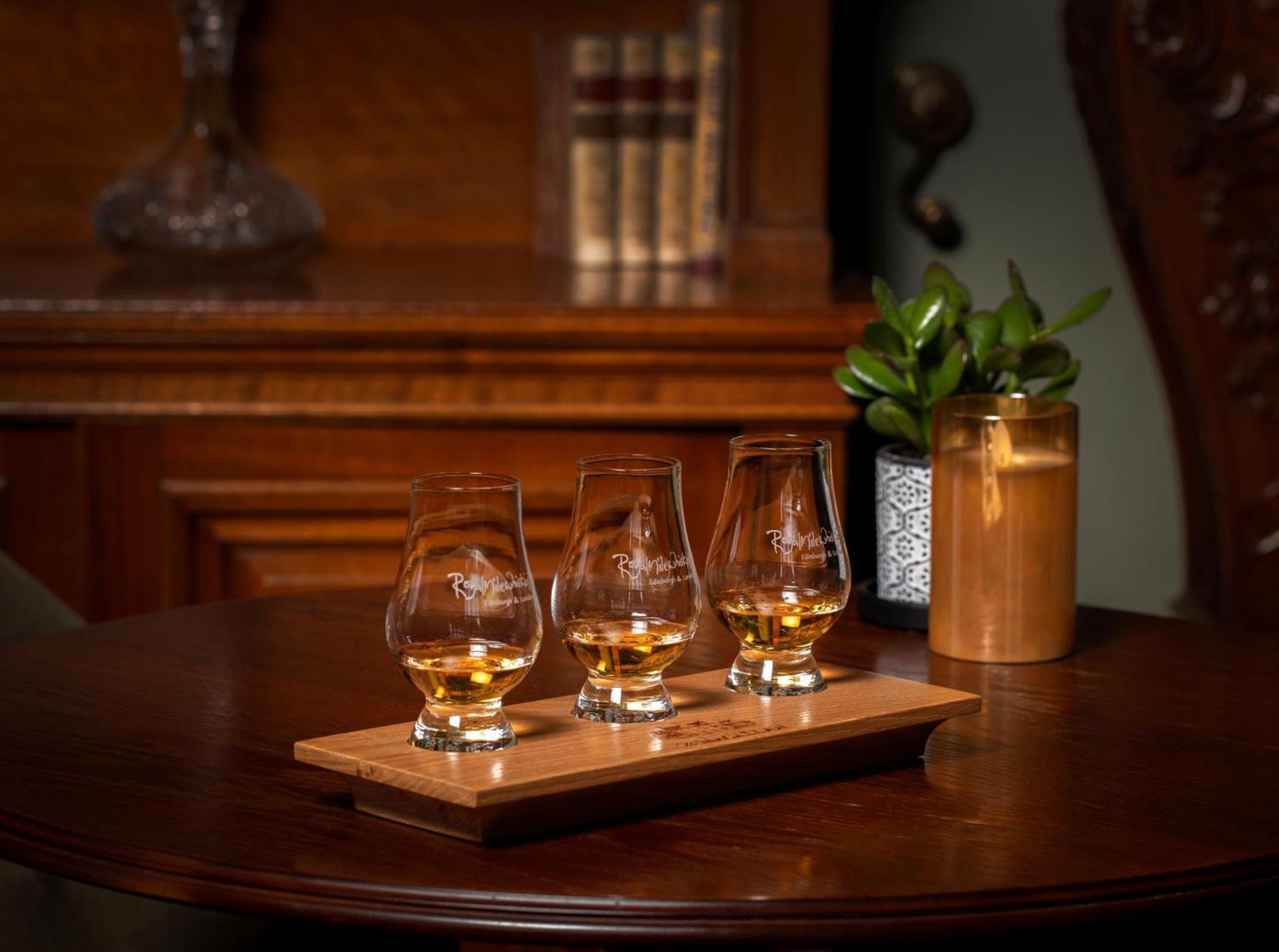 Schloss Roxburghe, Part Of Destination By Hyatt Eksteriør billede A tasting tray of four samples of Scotch whisky