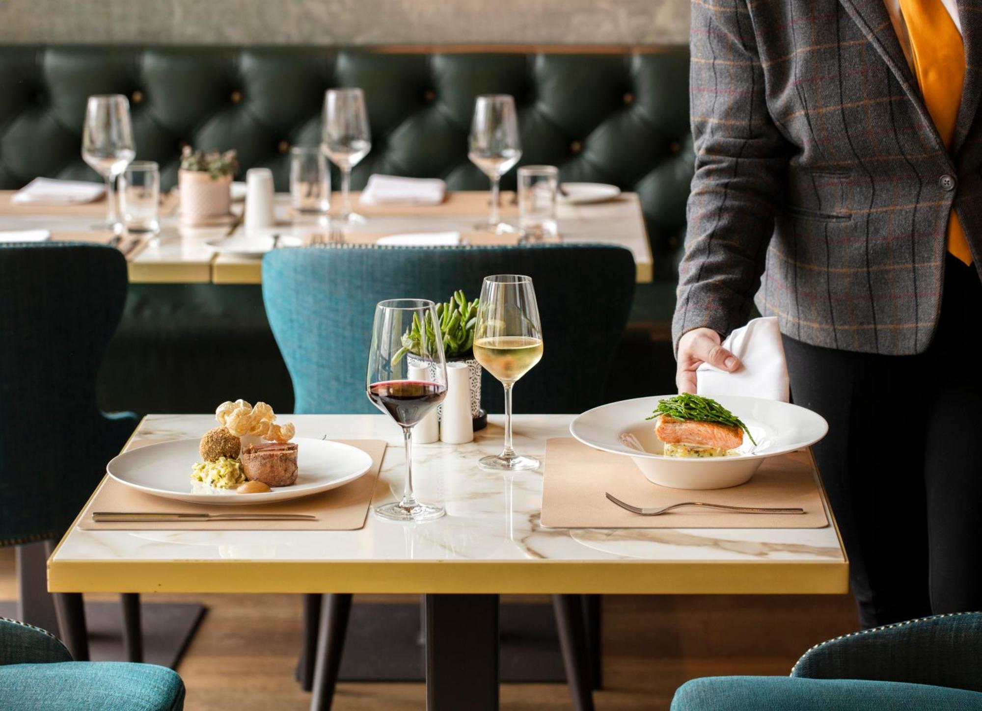 Schloss Roxburghe, Part Of Destination By Hyatt Eksteriør billede A server clearing a table